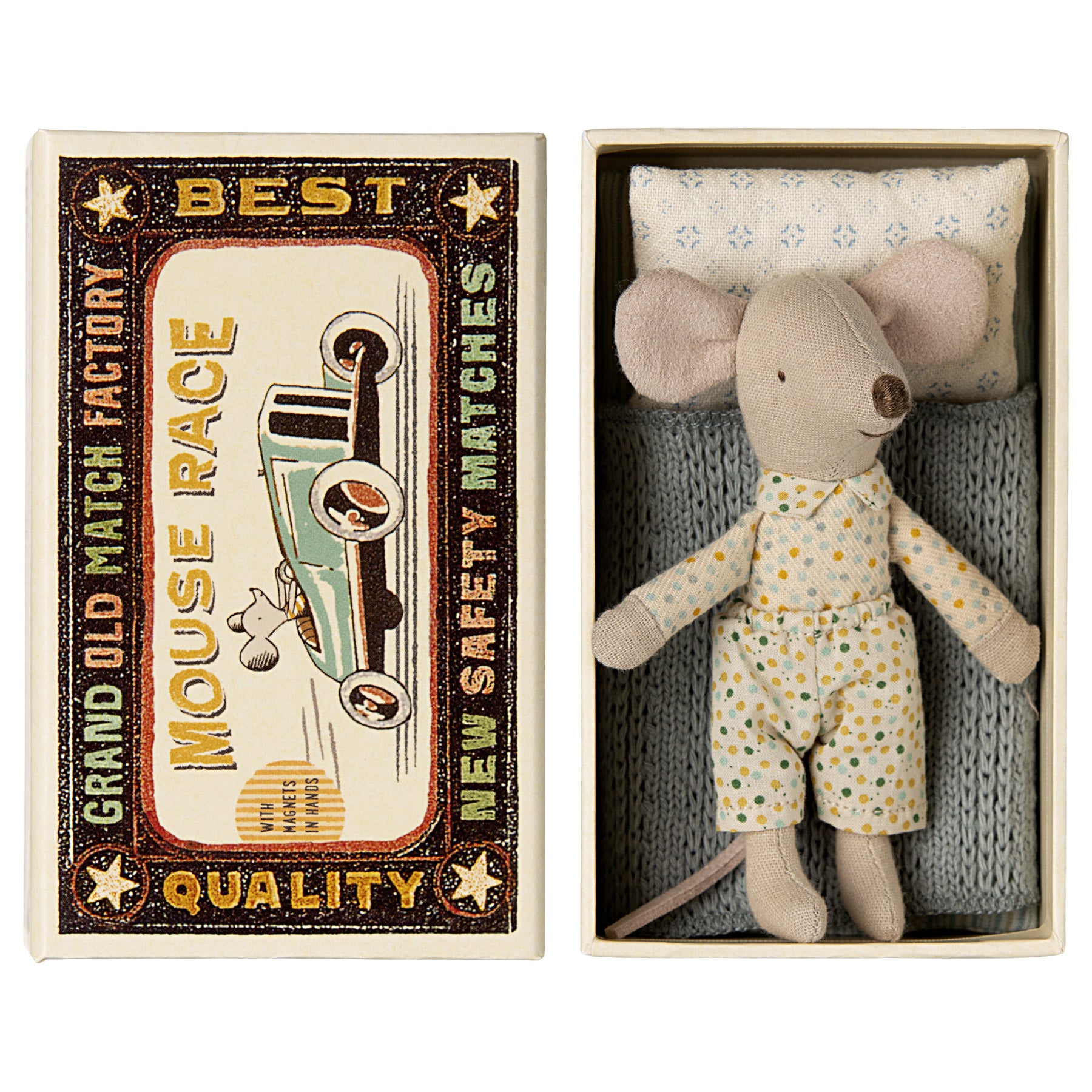 maileg little brother mouse in a multi spot outfit laying in a matchbox  bed with a blue knitted cover