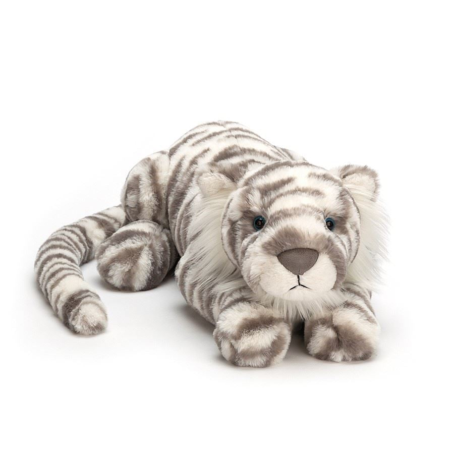 jellycat grey and white snow tiger with blue eyes laying down