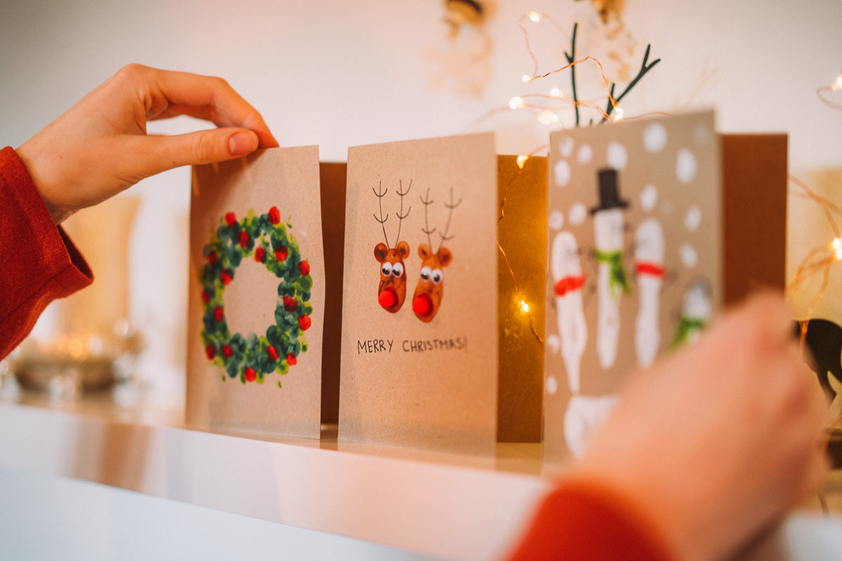 Snowmen, Reindeer & Christmas Wreath Christmas Card
