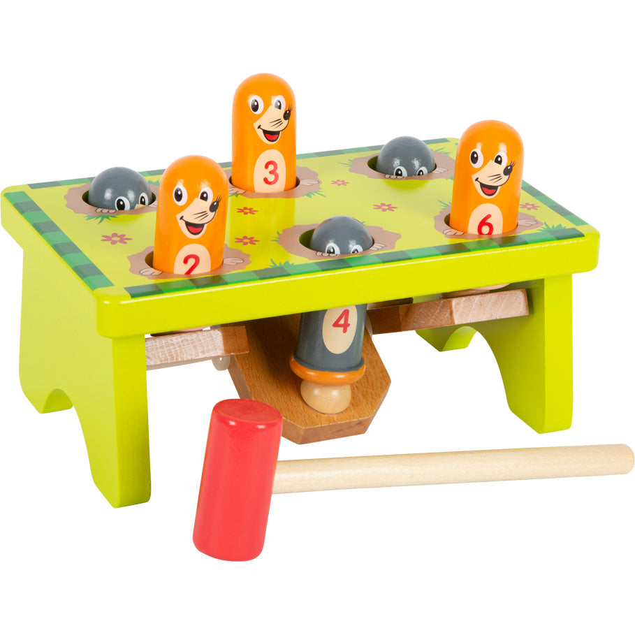 small foot bright green hammer table with little orange and grey moles
