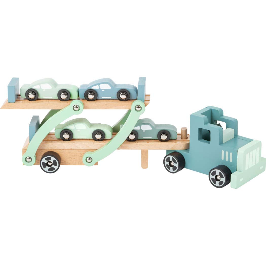 blue and green cars on the back of a wooden toy car transporter