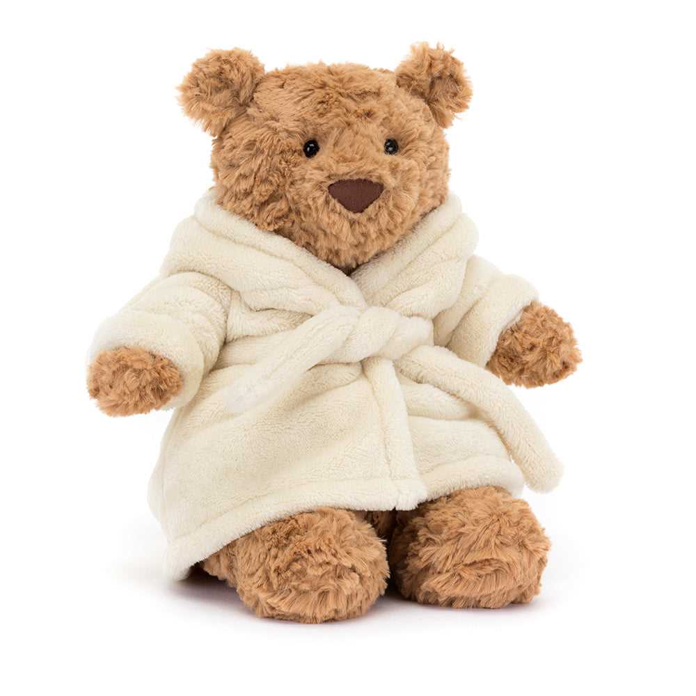 Jellycat Bartholomew Bear sitting in a cream Bathrobe