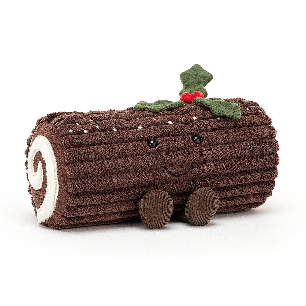 jellycat amuseable brown fabric christmas yule log, filled with a cream swirl. With bead eyes, embroidered mouth, cordy boots, and a dash of holly on top
