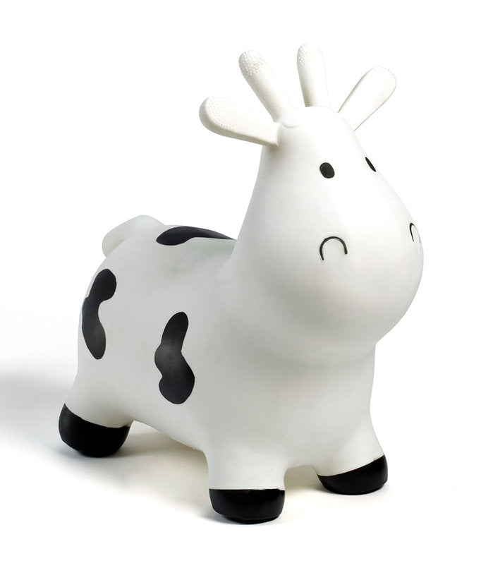 black and white happy hopperz cow bouncing toy