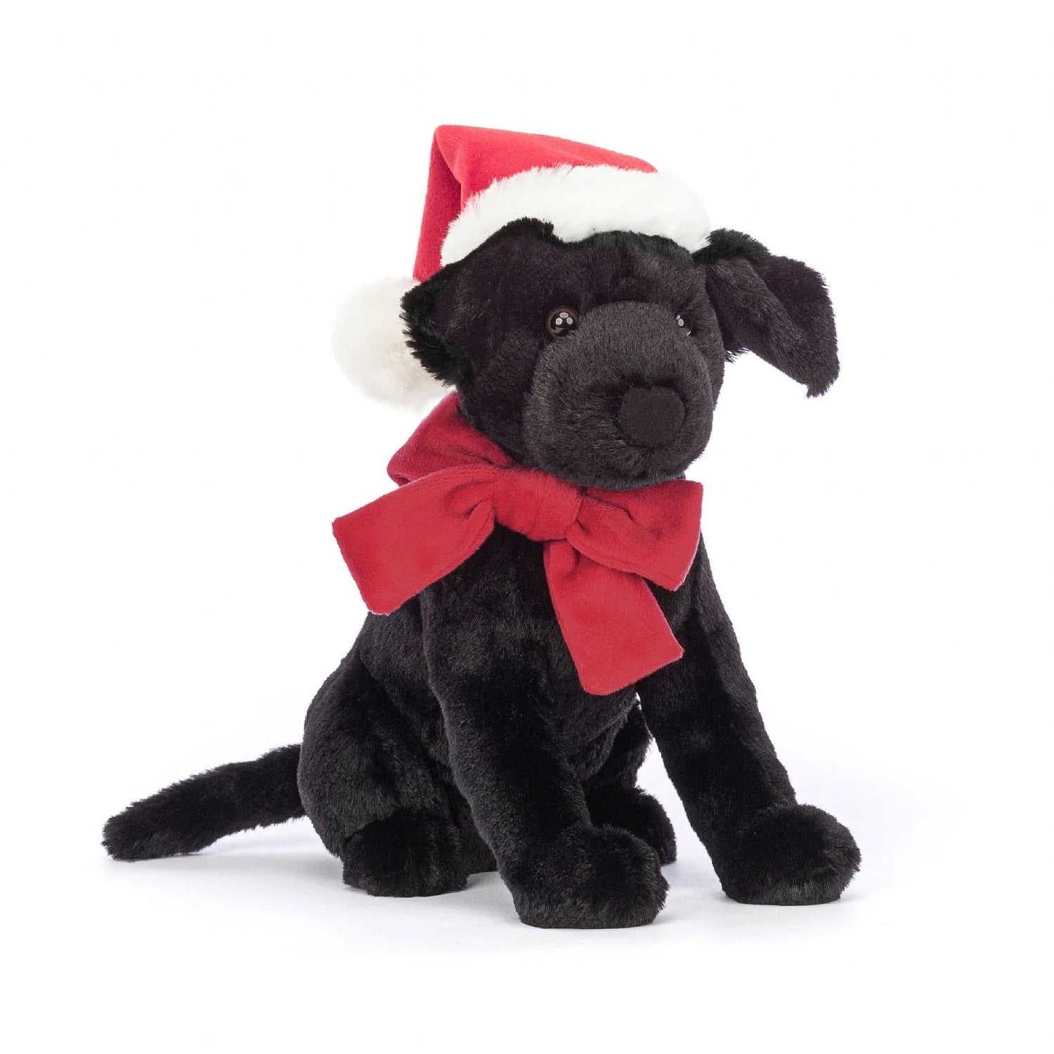 jellycat pippa black labrador wearing a christmas hat and a red neck bow