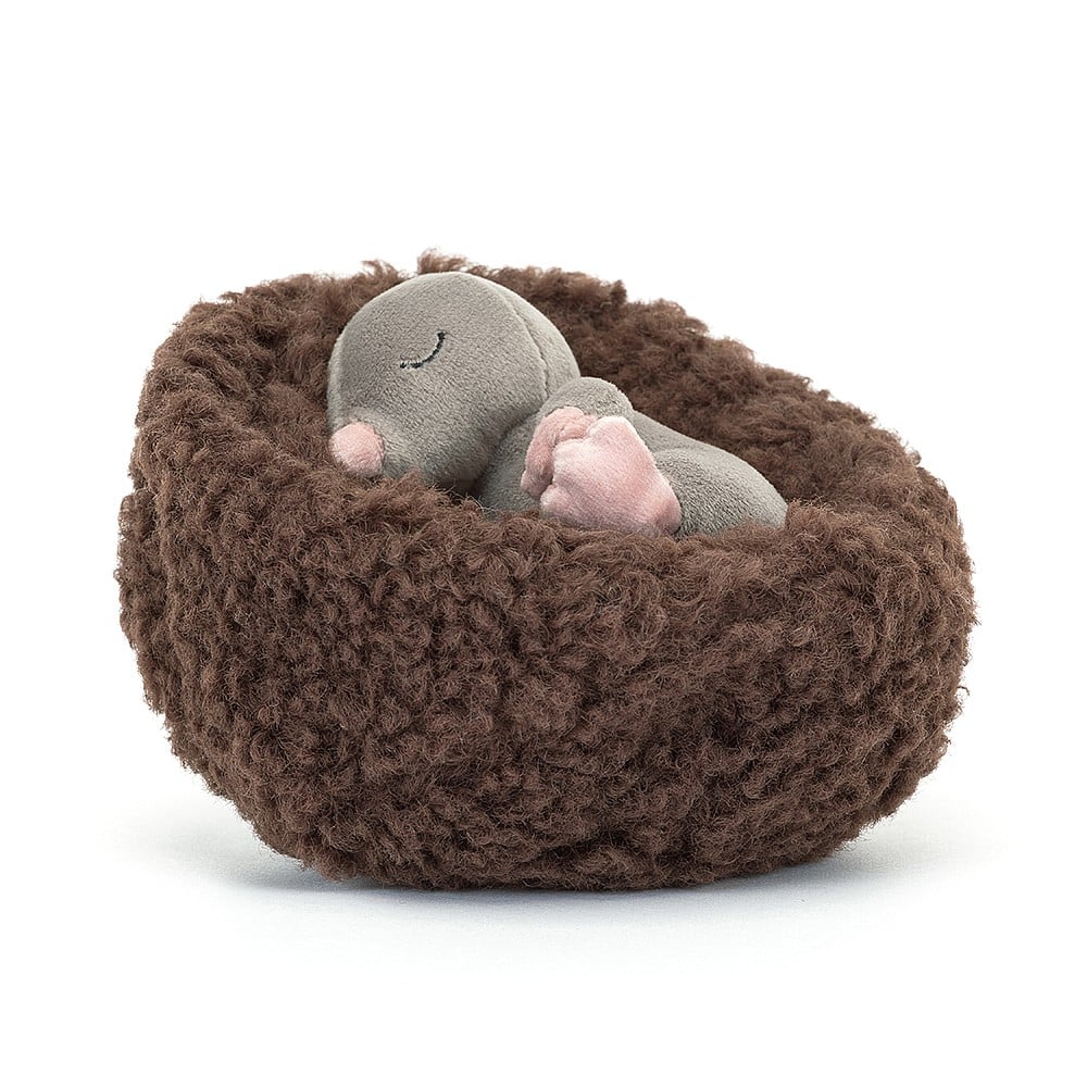 jellycat tiny little mole in a brown fur bed