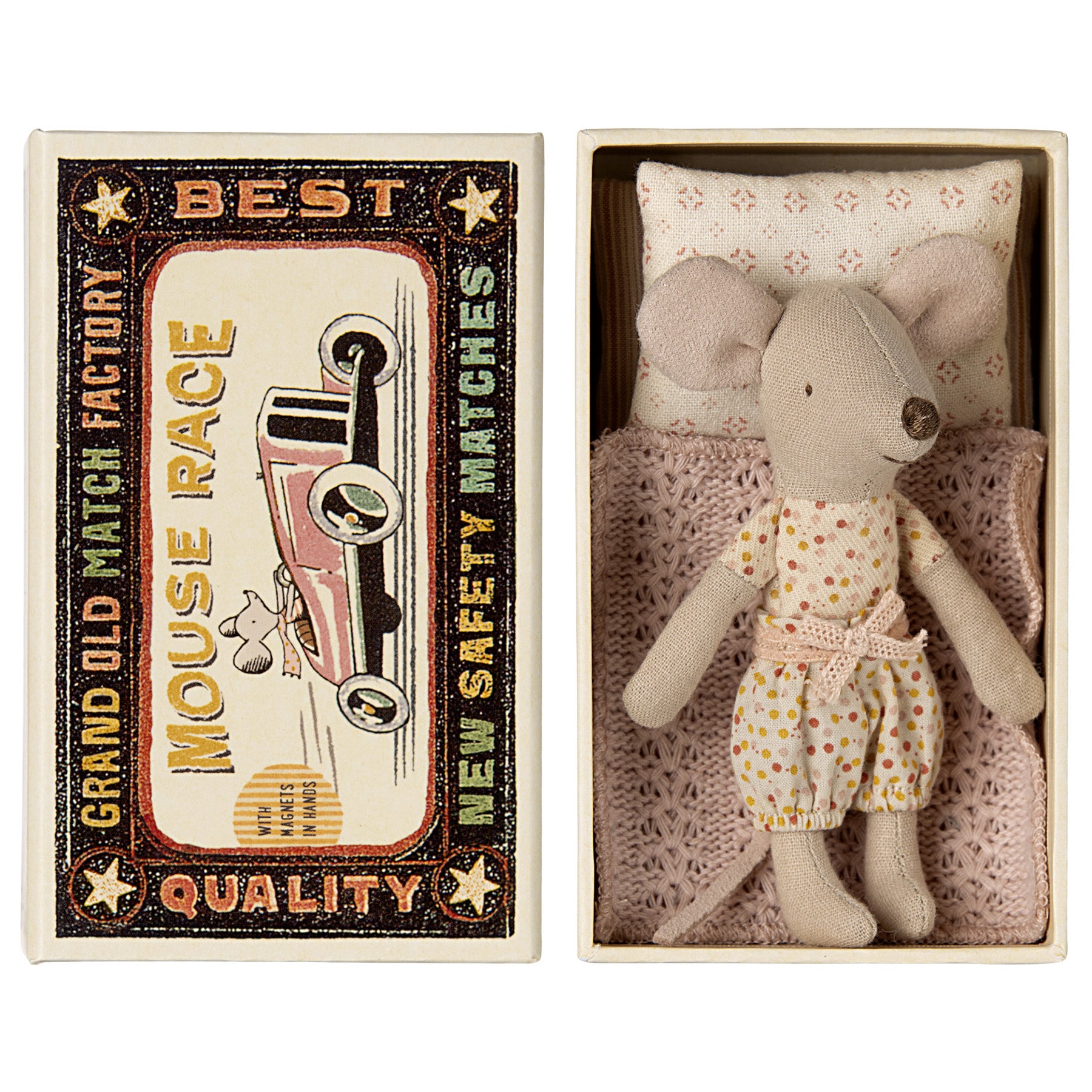 maileg little mouse laying in a matchbox bed with bedding
