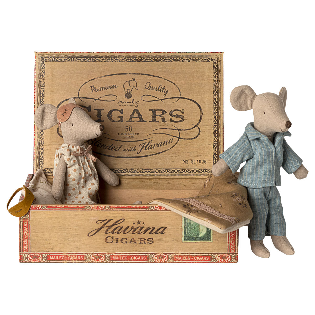 Two toy mice in a decorative Havana Cigars box on a white background