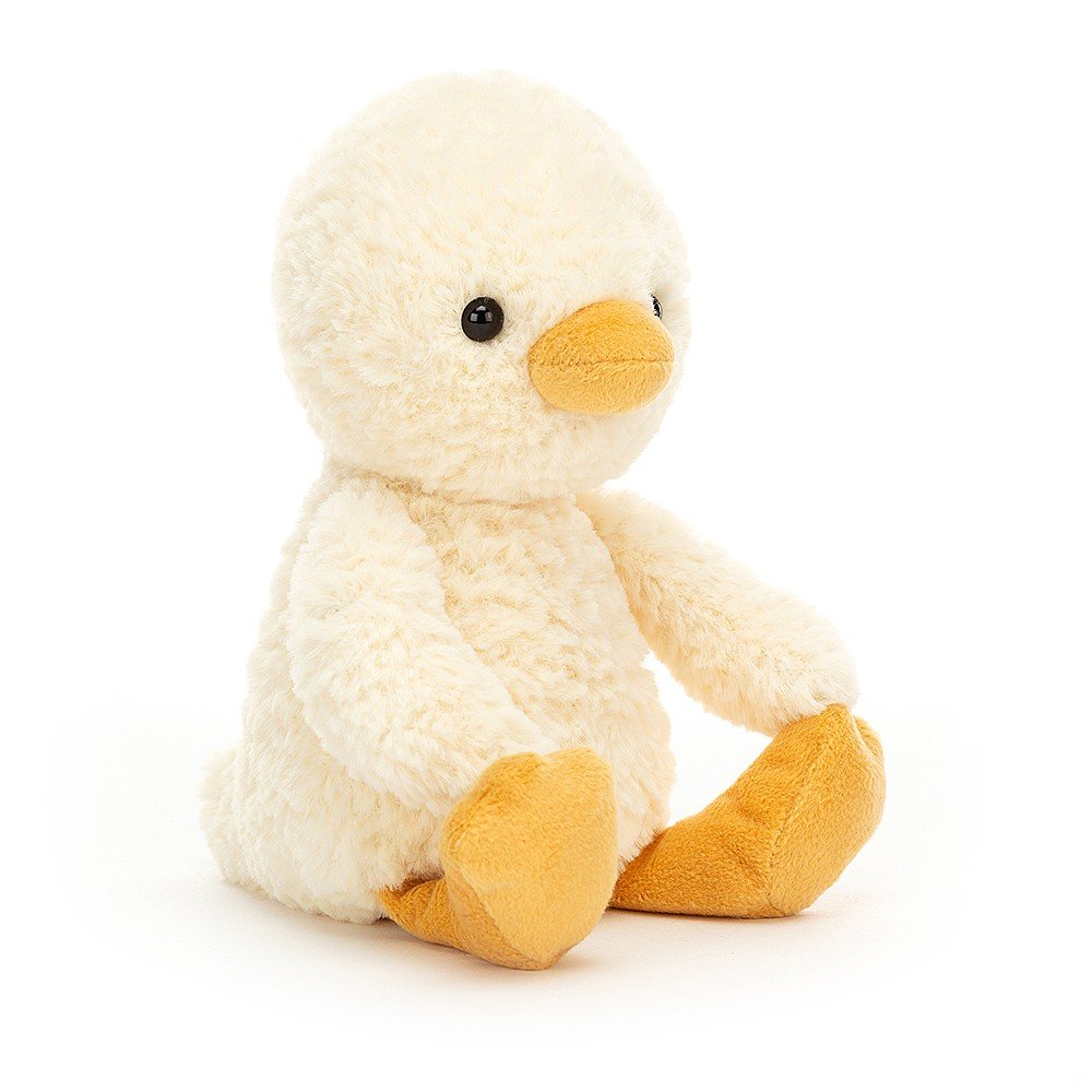 jellycat pale yellow chick sitting down with a dark yellow beak and feet