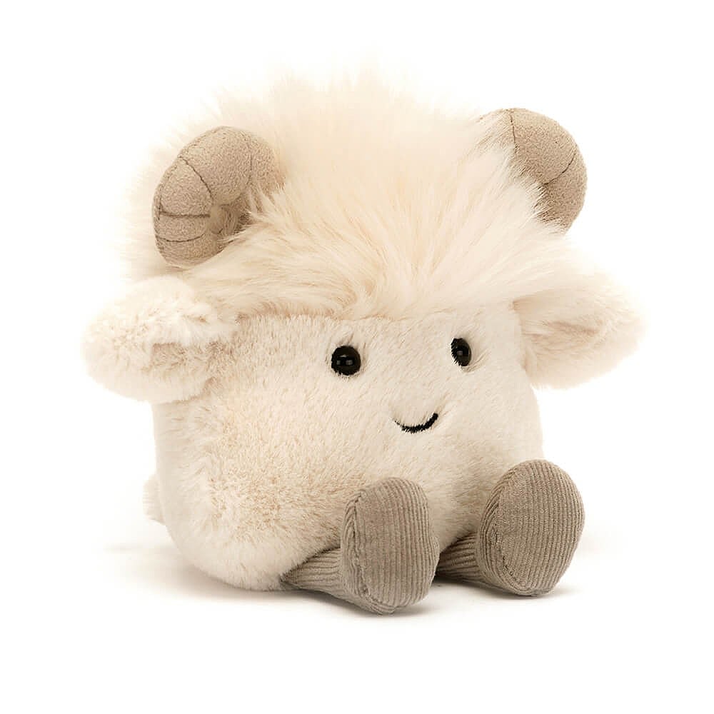 cream fur jellycat ram with black bead eyes, and an embroidered smiley mouth