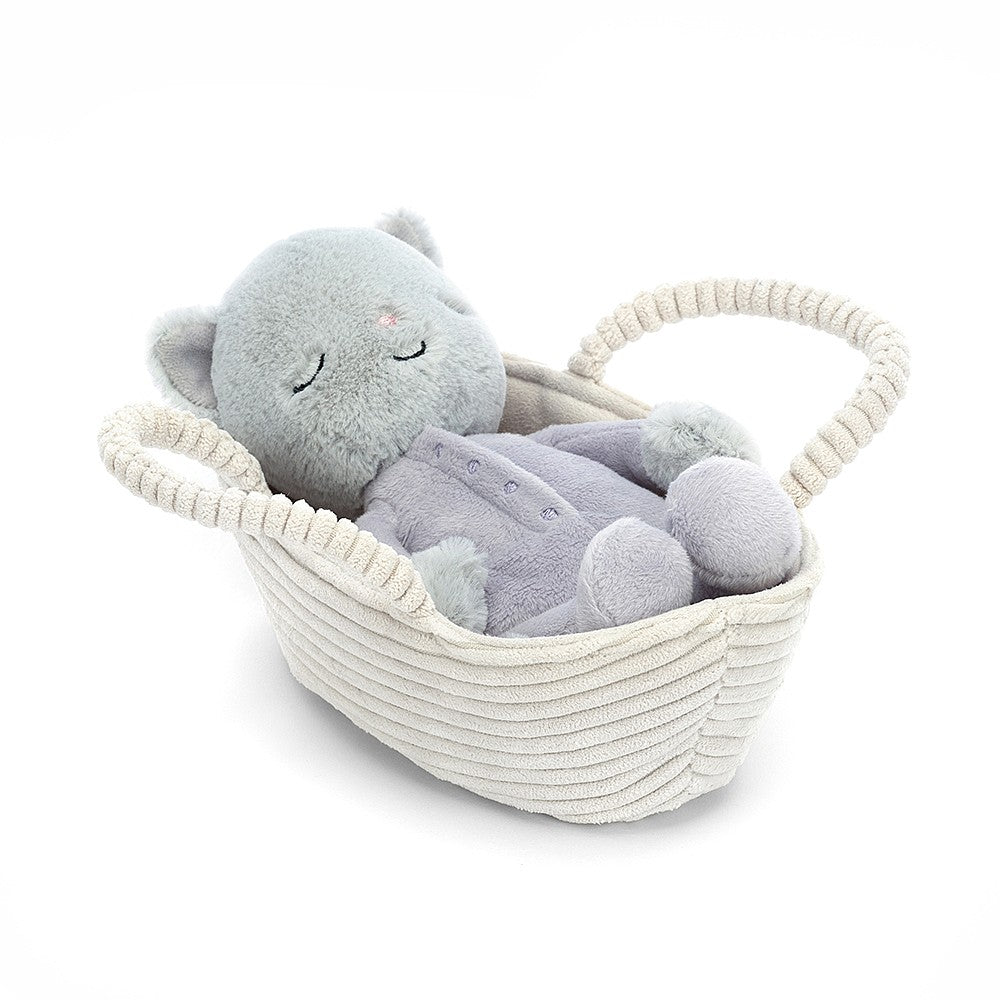 jellycat grey kitten sleeping in a corduroy carry cot