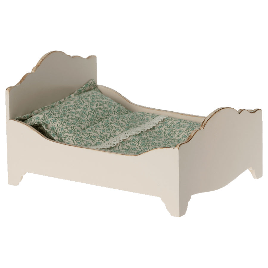 maileg white wooden mouse bed with green floral bedding with lace trim