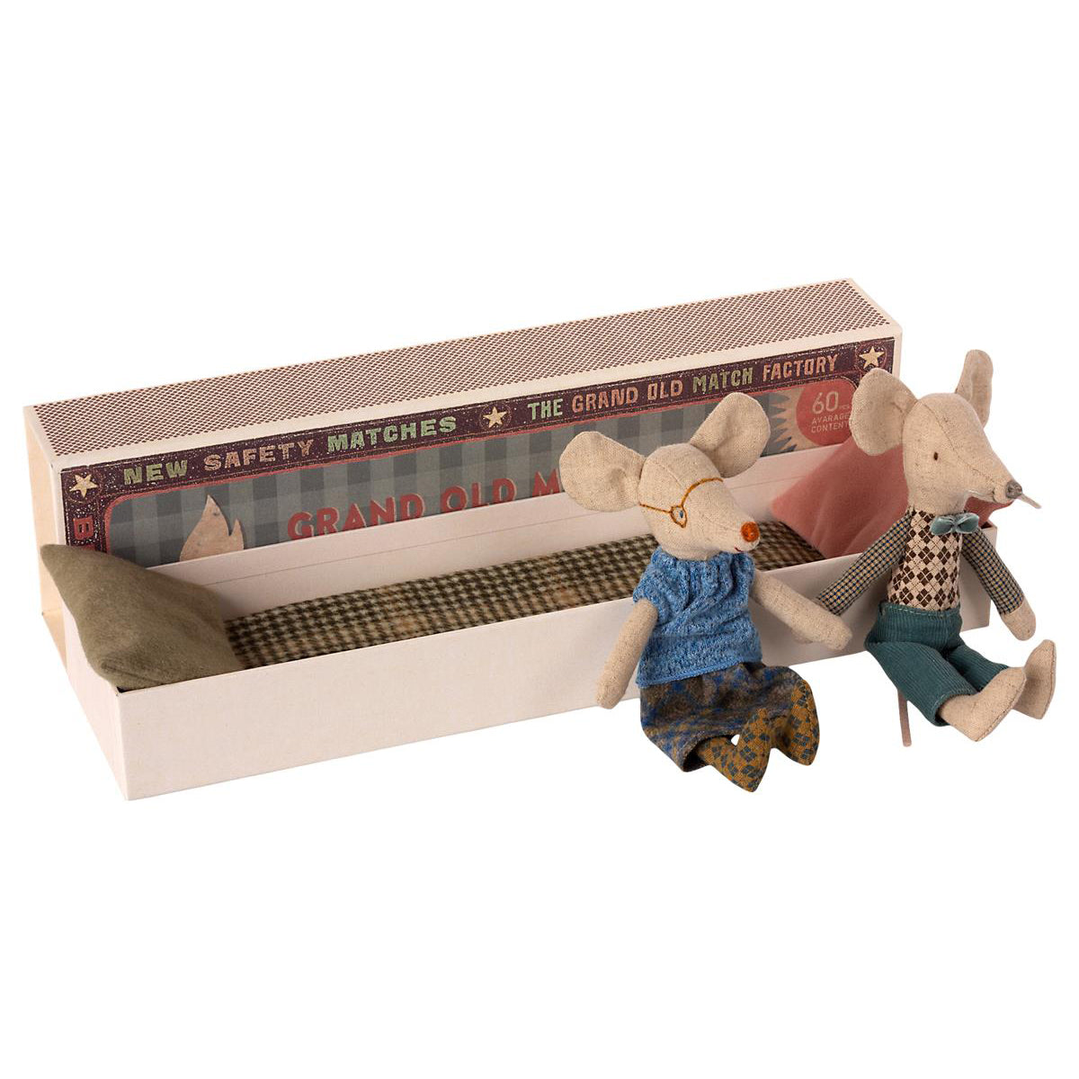 Maileg Grandparent mice are sitting next to their long matchbox bed.